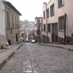Picture of cobblestone street in the old city of Quito, Ecuador
